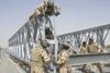 Australian and American combat engineers rebuild the Mabey Johnson Bridge in Afghanistan.