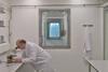 A Pirbright Institute scientist working inside a high-containment laboratory in the institute’s Plowright Ӱ