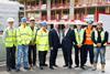 Vince Cable and Steve Bowcott with Kier apprentices