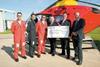 CAB Director Justin Ratcliffe and Technical Officer David Earle with County Air Ambulance staff