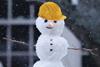 Snowman in hard hat