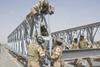 Australian and American combat engineers rebuild the Mabey Johnson Bridge in Afghanistan.