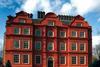 A £5m project has restored Kew Palace in west London to its condition in the early 19th century, when its served as the palace of George III. Brickwork was made good, finished in a lime wash