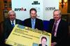 With the 2,000th card are: Tony Morgan, President, Electrical Contractors Association; recipient Andrew Vick and Sir Michael Latham.