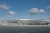 Farnborough airport’s new terminal and operations building evokes modern aircraft by its long, sleek, streamlined form, faced in shiny aluminium
