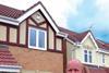 Sean McGann, MD of Sterling Windows, in front of what is possibly the first A rated window installation