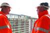 Berkeley Homes employees don their high-visibility jackets and hard hats