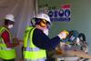 Workers on a Jobcentre refurbishment take due precautions with dust masks