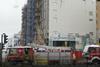 Contractors were believed to be trapped under collapsed scaffolding and up to 20 were hurt after two walls of a Jury’s Inn hotel under construction in Milton Keynes collapsed on Tuesday.