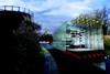 Niall McLaughlin Architects' houseboat stores furniture hung from the ceiling