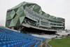 This view of the pavilion from the neighbouring stand shows how the triangular metal cladding wraps around the building