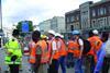Better safe than sorry: Workers in central London leave a site after a  security alert on Monday