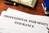 Professional Indemnity insurance form on desk
