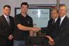 John Moore of PAL Security is presented with his detector test equipment by Trevor Boxer