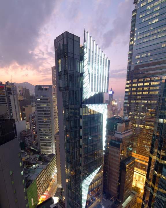 Woods Bagot's retail tower opens in Hong Kong News Building