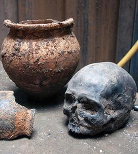 Roman skull and cremation pot