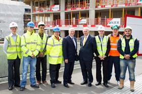 Vince Cable and Steve Bowcott with Kier apprentices