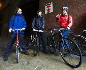 Chris Boardman (in red) with fellow cyclists