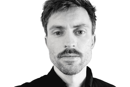 tomloweheadshot2_100098_crop.jpg-Photoroom