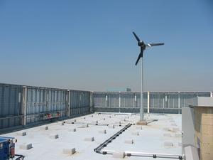 In built up areas, wind turbines are often located on top of buildings