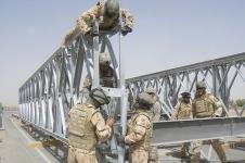 Australian and American combat engineers rebuild the Mabey Johnson Bridge in Afghanistan. 