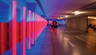 More than 150 LED luminaires are mounted on a curved panel on the tunnel wall, with lighting scenes and sequences controlled by a central computer. 