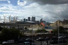 Construction site at East India Dock with Canary Wharf in background