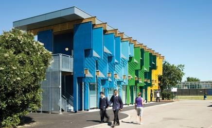 This vibrant structure, designed by Jonathan Clark Architects, is part of a £1.1m extension and partial conversion of a two-storey sixties school in Feltham near Heathrow