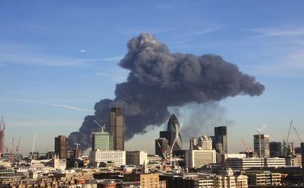 The fire on the Olympic site in east London last month; sprinklers would have significantly reduced and cooled the smoke  