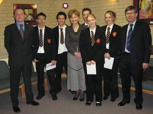 CIBSE members Andrew Saville and Chris Lindsey present book tokens to students (l-r) Robert King, Harry Morgan, Stephen Shute, Charlotte Whittall and Lucy Baines, with their ICT teacher Jean Smith