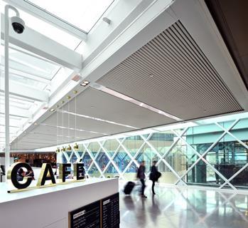 A linear aluminium ceiling system was installed internally and externally on the M&S link bridge
