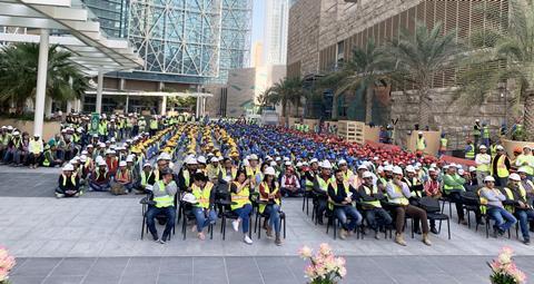 5) Workers celebrating their success at the Qatar Petroleum District project in January 2020