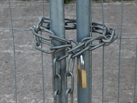 Locked construction site shutterstock_1478718329