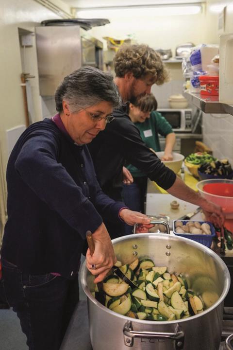 Bishop Guli helping at One Roof winter homelessness night shelter in Leicester - she is patron