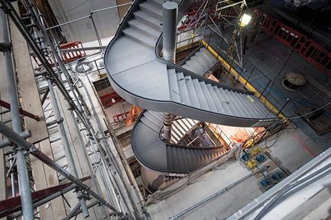 Helical staircases help subdivide the giant atrium