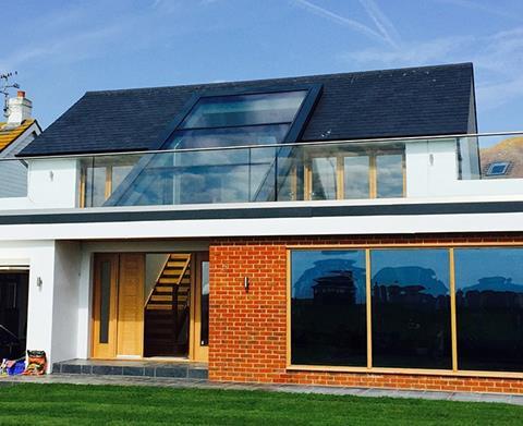 For this detached house in Worthing, Sussex, DVS supplied a bespoke PR60 glass roof with triangular glazed gables