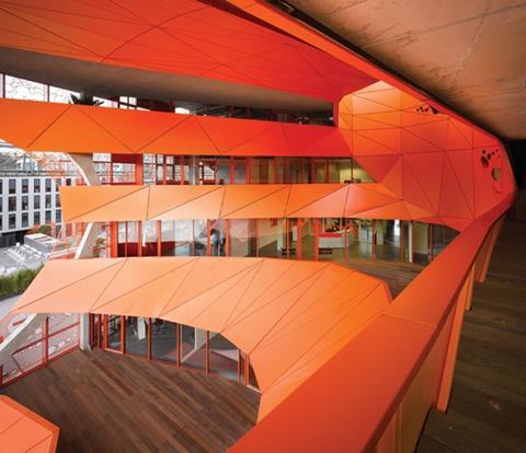 The atrium is a dynamic vortex that reconfigures the Orange Cube’s light and spatial characteristics