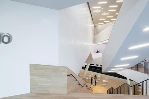 The foyers are composed of a dynamic sequence of floating volumes and plunging voids