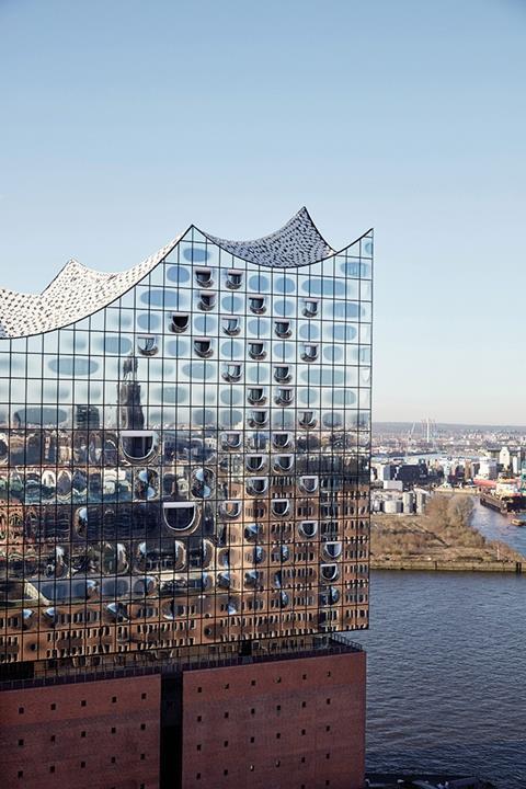 The Elbphilharmonie rises above a retained 1960s warehouse