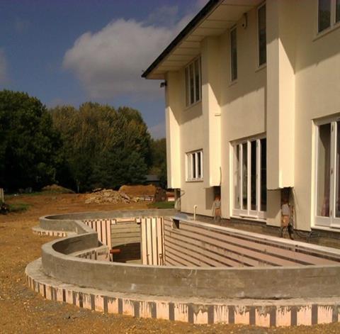 This basement has been designed with curved walls and an upstand