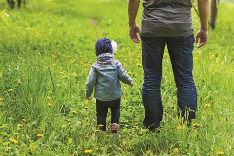 dad in park with daughter