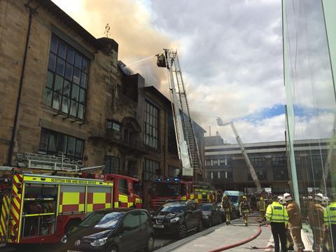 Firefighters tackle the blaze at the Mac