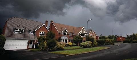 Storm clouds approach a housing estate in Worcestershire UK in summer