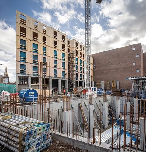 Prefabricated panels, fast construction and the ease of fixing services to CLT compared to concrete shave 10% to 15% off the cost of the overall programme. Prefabrication also means the site is eerily quiet with just five men needed to assemble the first