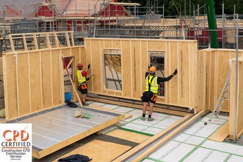 Construction Workers Installing Wall Panel with logo