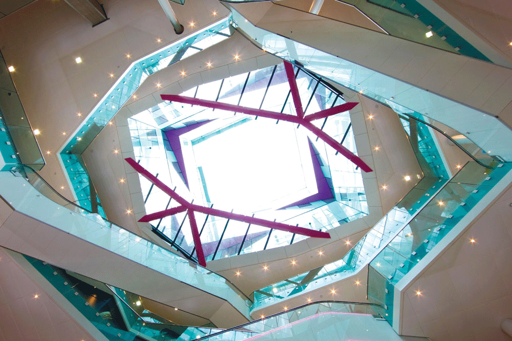 A view looking up through the courtyard reveals the spatial complexity that defines the “inner” cube