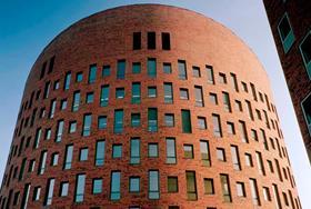 Budget uncertainty hits brick firm’s trading in final quarter