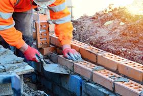 Payments to bricklayers slide by more than 10%